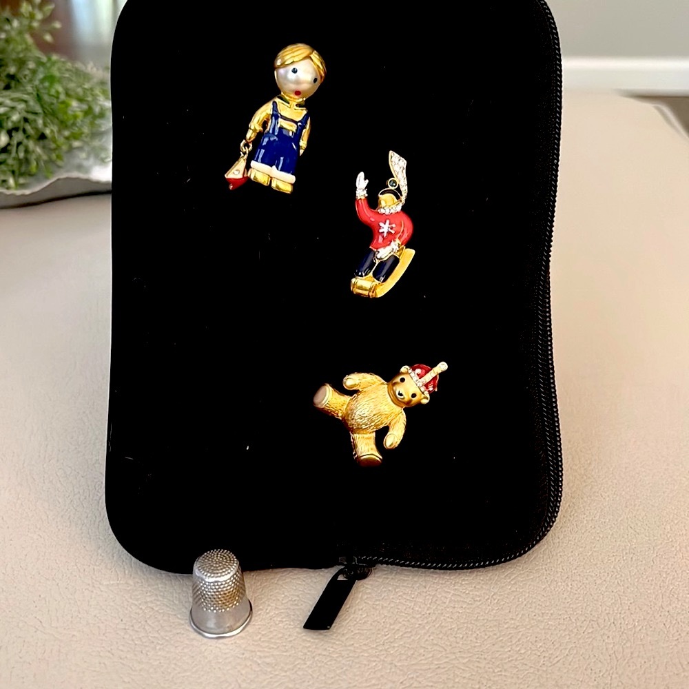 Set of three enameled vintage pins